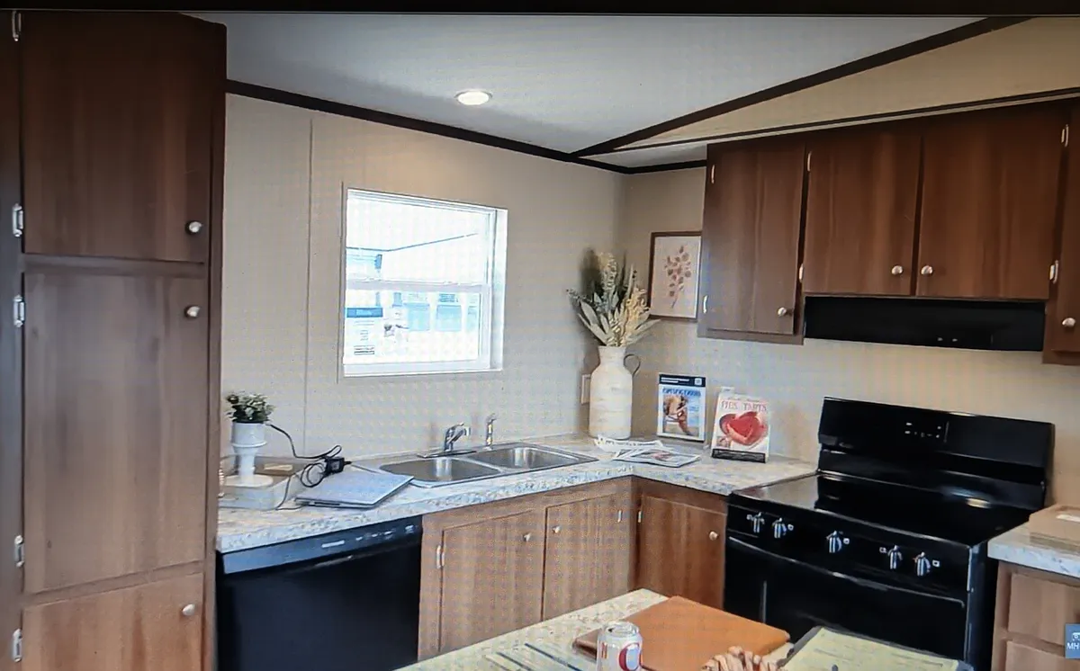 Kitchen, dishwasher pantry with window at sink. - 1750 John Wells Rd #23
