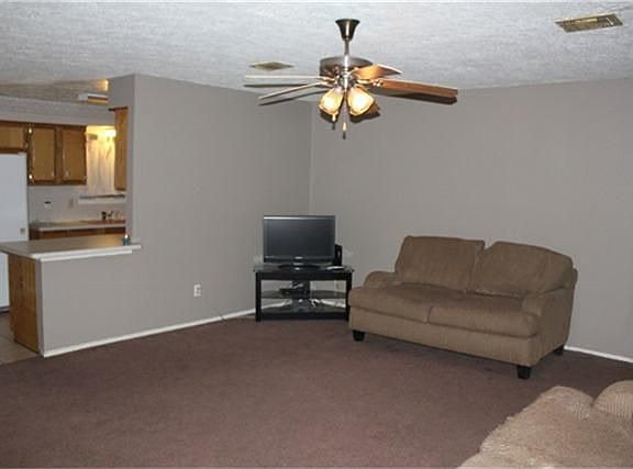 Kitchen opens to living area