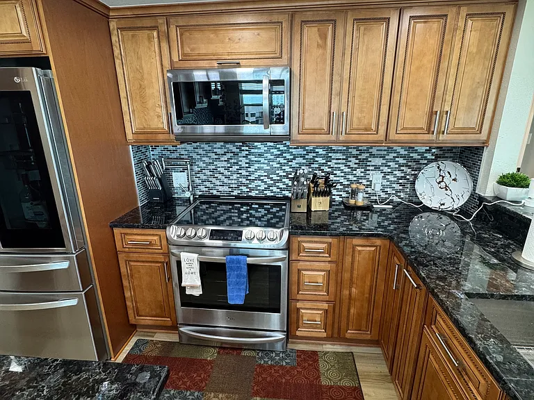 Induction stove and microwave, pot filler by stove