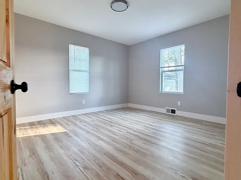 Spacious Master Bedroom 1/6 with large closet, new flooring, and lots of natural light