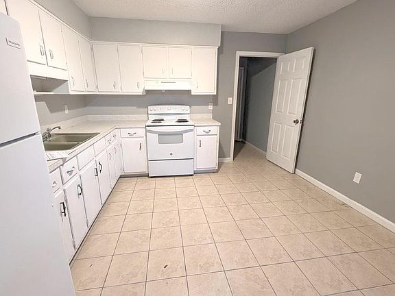Spacious kitchen with lots of storage. Attached mudroom with backyard access - pending beautiful upgrades