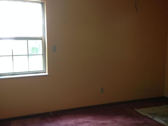 One of the Three Bedrooms