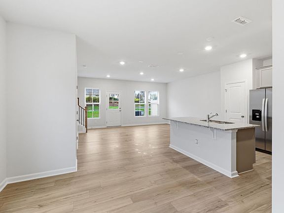 Grisham 5 - Kitchen Island has Extra Seating allowing Connectivity while you Prepare Meals