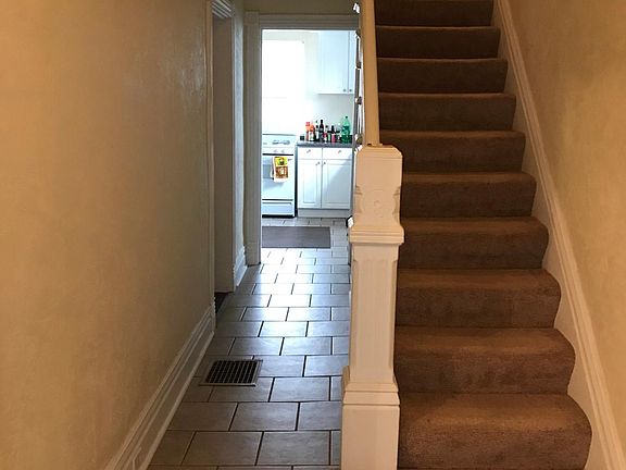 ceremic tile in foyer and hallway