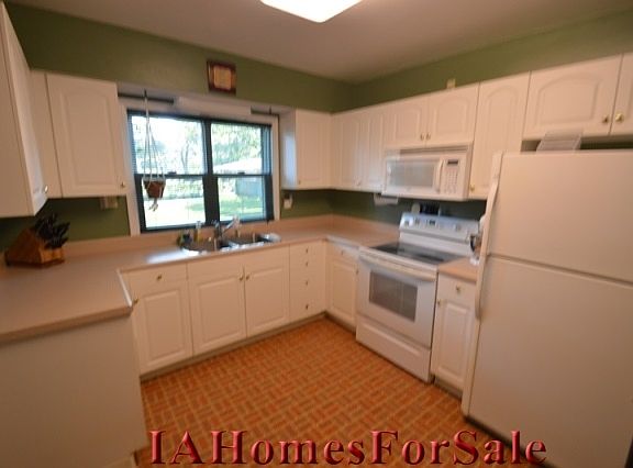 Overhead light and pleny of counter space.  Window looks out over back yard.