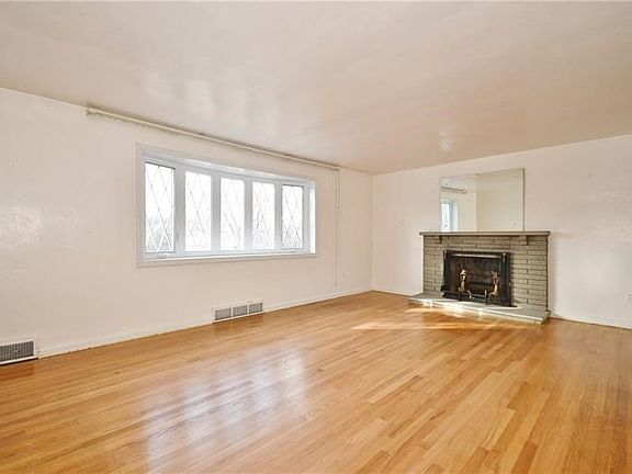 The stacked stone fireplace adds a great accent to the living room.
