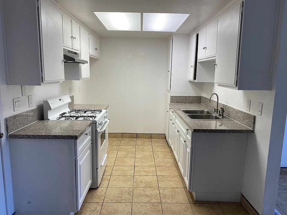 Kitchen with new sink, granite countertops and oven