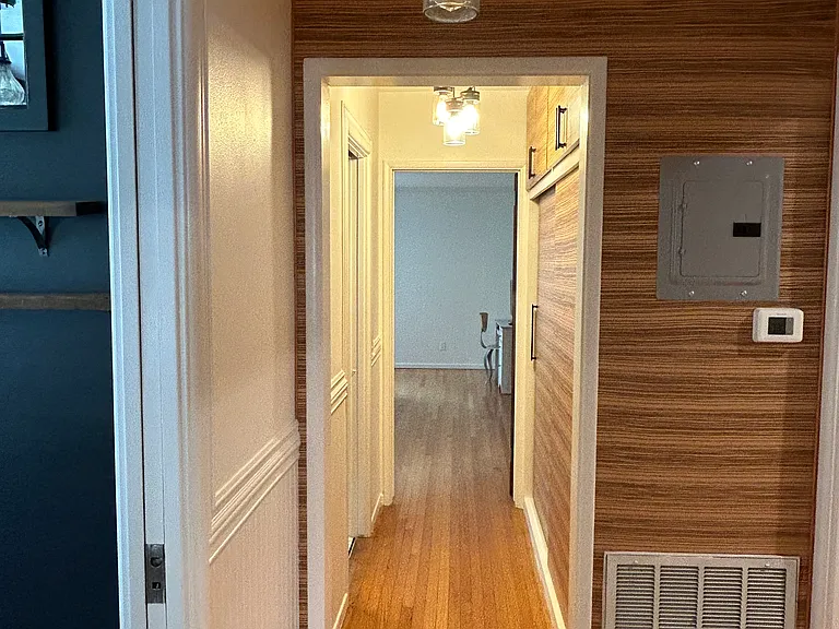 Center hallway, kitchen to the left.