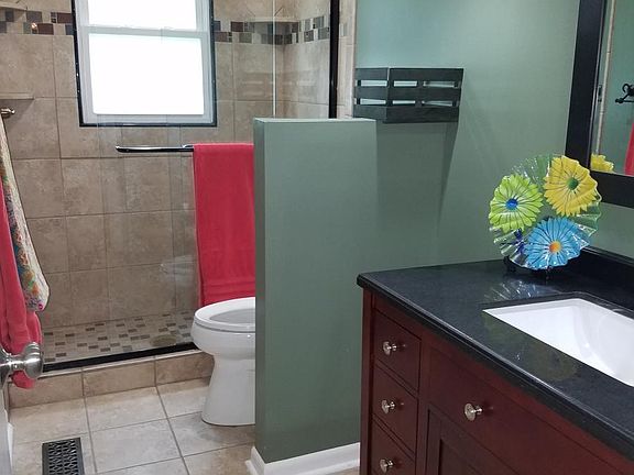 2nd Bathroom has walk-in shower with bench