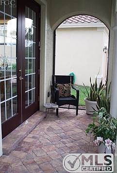 Relax on your screened front patio.