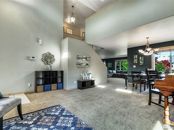 Here's another photo showing the stairs and a peek into the family room. 