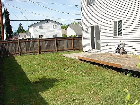 Sunny fenced backyard