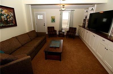 The big living room has new custom built-in cabinetry.