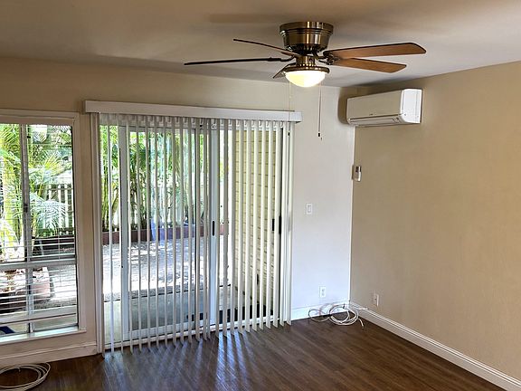 Living room looking out to the lanai and yard