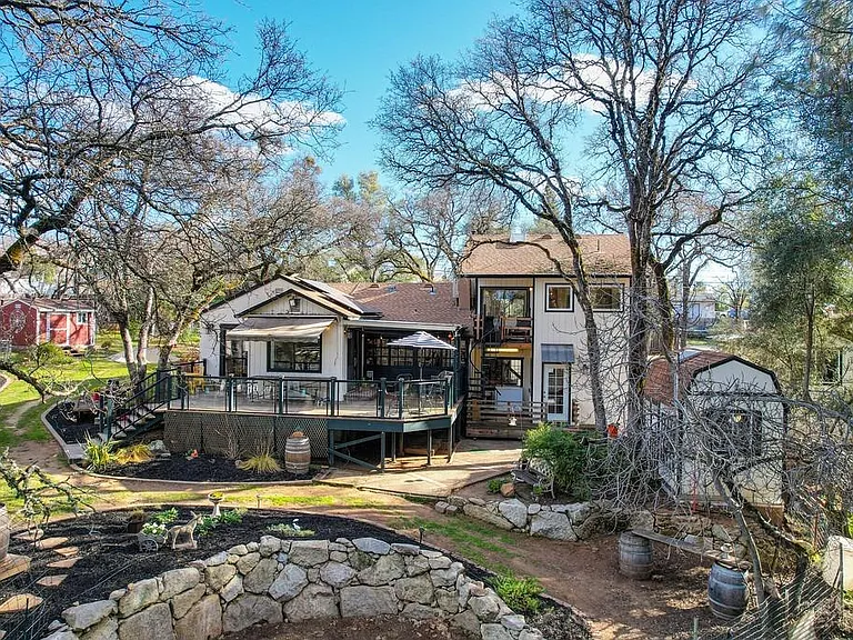 A view of the backyard, which you will have access to, and the adjacent house.
