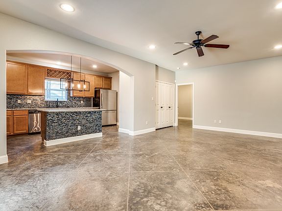 3116 Waits. Living Room and Kitchen with island and all stainless steel appliances. Walk to TCU.