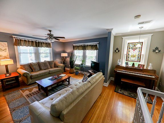 Large livingroom area on the main floor with ample light and windows.