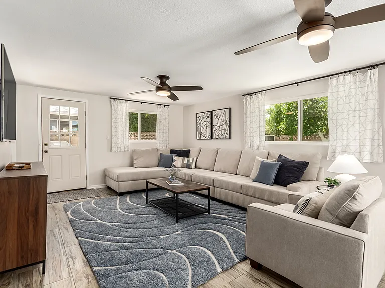 2nd Living Room with comfy sectional, Smart TV, books, games and plenty of natural light!