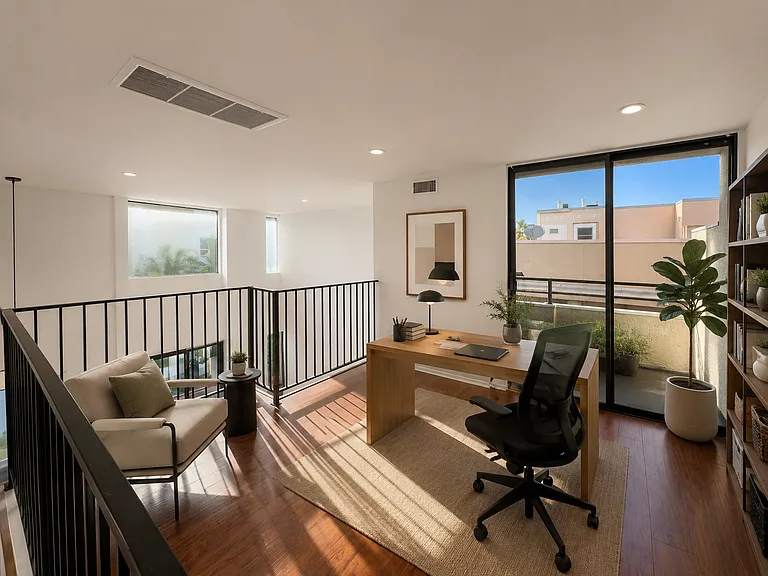 staged photo of loft as office use