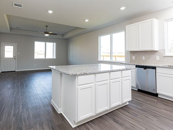 Kitchen to Dining Area and Family Room