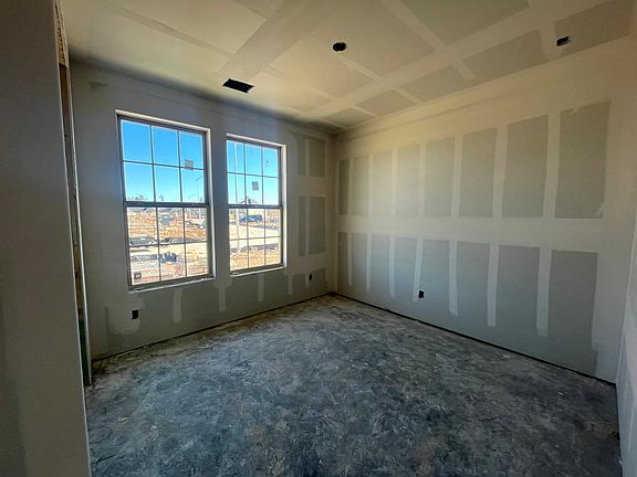 Construction progress - secondary bedroom with large windows
