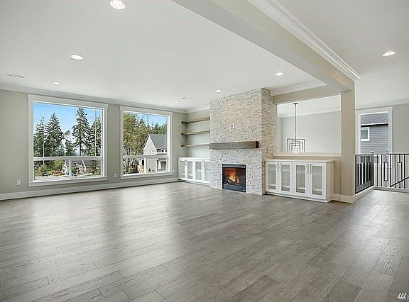 Large windows in living room allow for lots of light