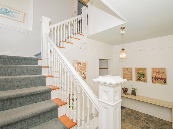 Shared front door entry. Stairs to upper unit.