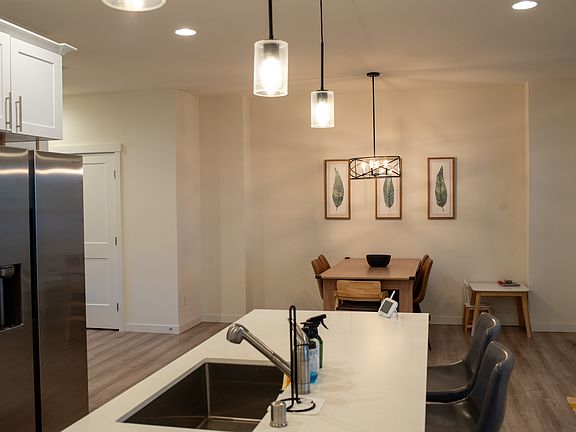 Kitchen & dining room. Large windows on the right
