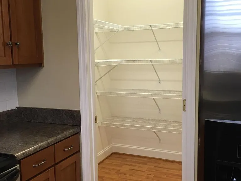 Large walk-in pantry off kitchen.