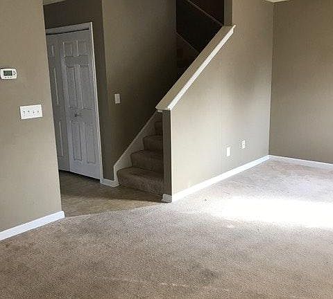 living room/entry open stairs