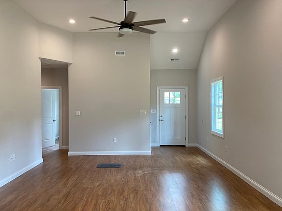 open concept look from the kitchen to the living space