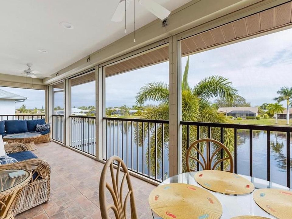 Enormous lanai with new lanai furniture and bistro table