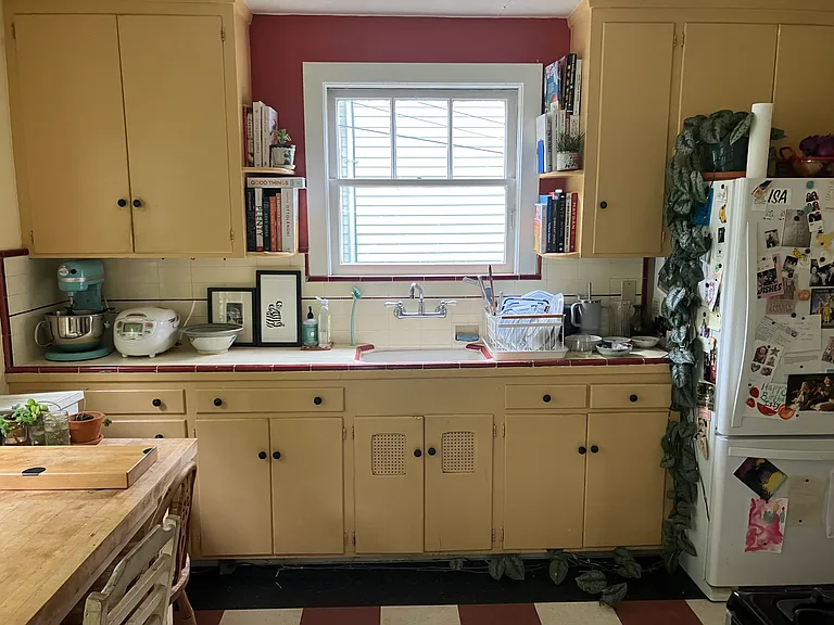 Standing in sunroom looking into kitchen