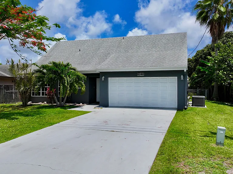6048 Garrett St — Photo 3
