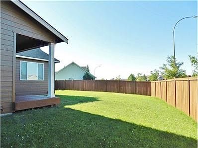 fenced yard with private gated entry
