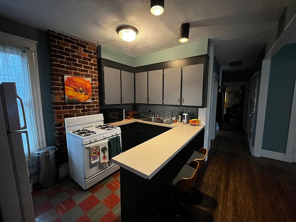 kitchen and hallway to bedroom and office