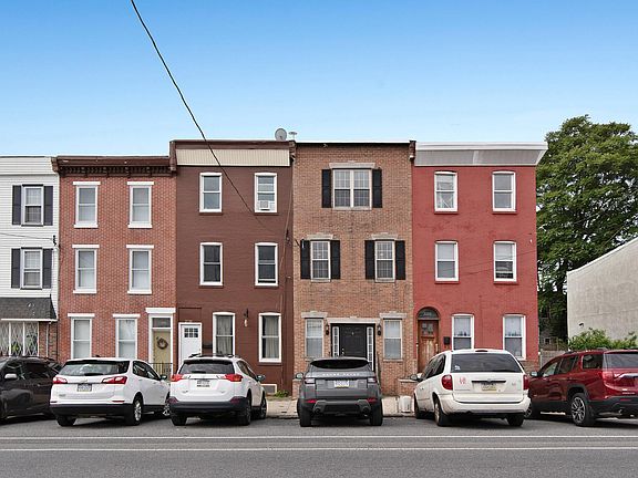 Front of house with angled parking