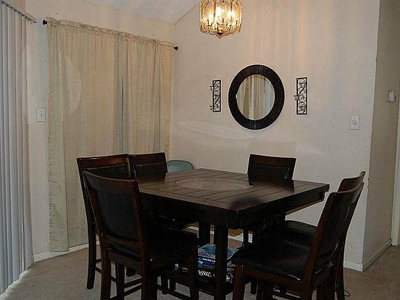 Breakfast /Dining combo with view of backyard through the glass sliding doors