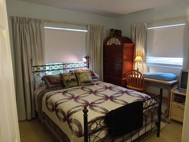 This is the same bedroom with a queen-size bed, so you can see there is space for other furniture. (The bed is no longer there, so you can provide your own.) (I am leaving the brown tall antique dresser, for you to use.) Very light and airy. Deep closets