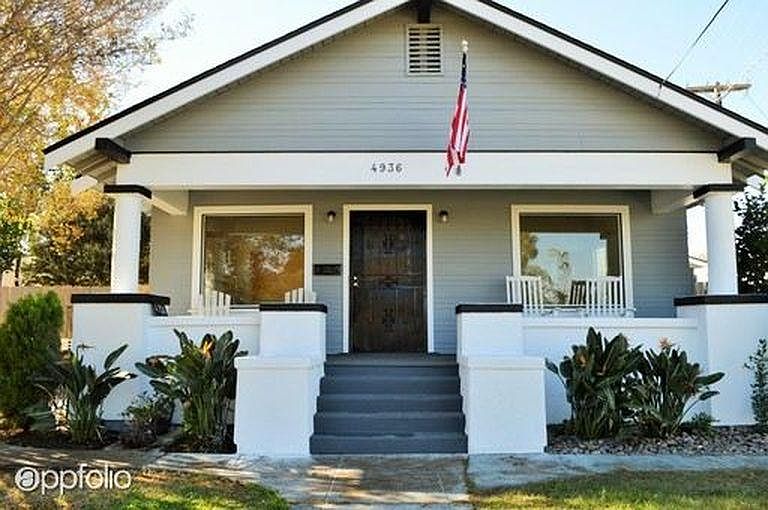 Freshly painted exterior with over-sized front porch, large