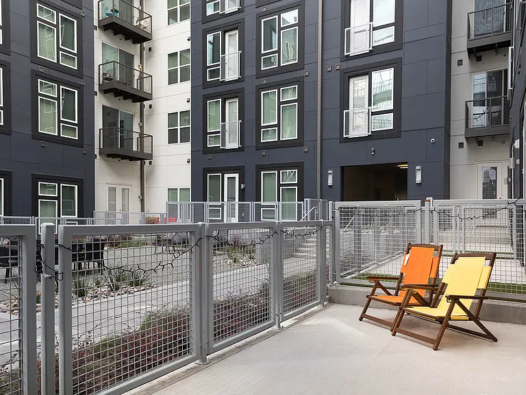 Enjoy the peaceful courtyard from your private balcony.
