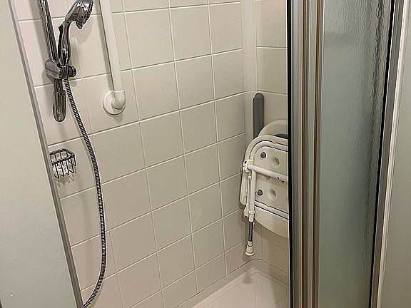 Fold down shower chair 