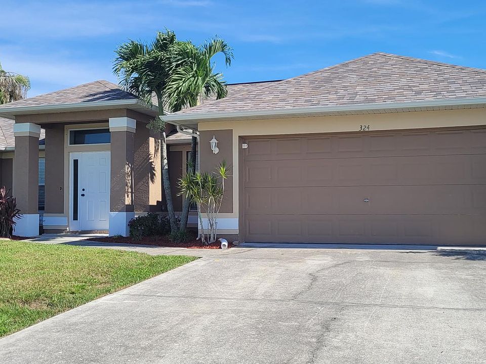 1st image of 324 NW 10th St