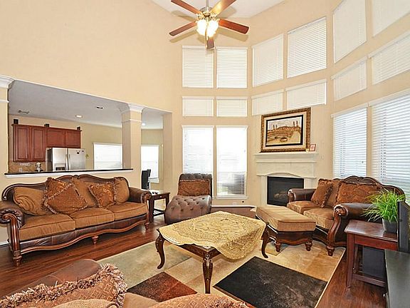 High ceilings and plenty of windows give this room an open feel and add so much natural light.