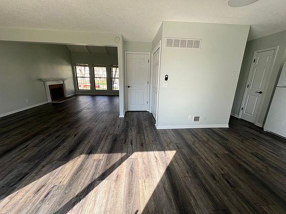 Living room/dining room/basement door/closet/back hallway