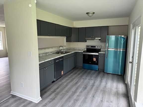 New kitchen appliances and cabinets