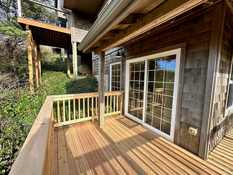 Covered deck off living room (ocean side)