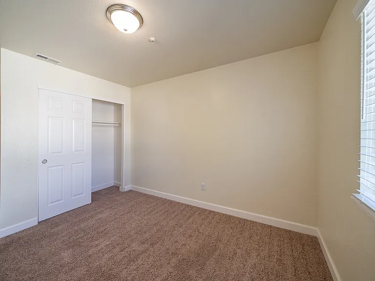 Spacious, carpeted bedrooms.