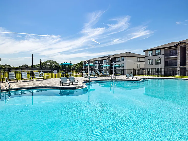 Community swimming pool and deck at The Groves at Lake Juliana