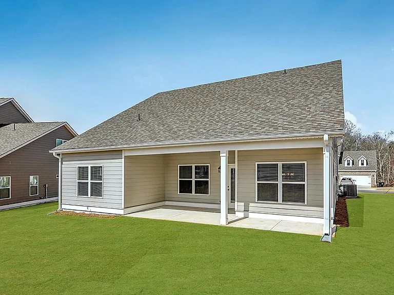 Covered patio on the exterior of the Maxton home.